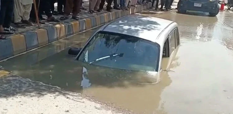 Woman rescued after car plunges Into deep pit on Tariq road